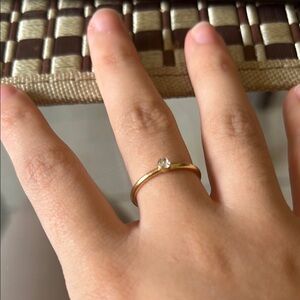Elegant Gold Ring with Diamond Accent